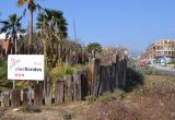 Imatge del cartell de Viles Florides que s'ha instal·lat a Reus a una rotonda de l'avinguda de Salou